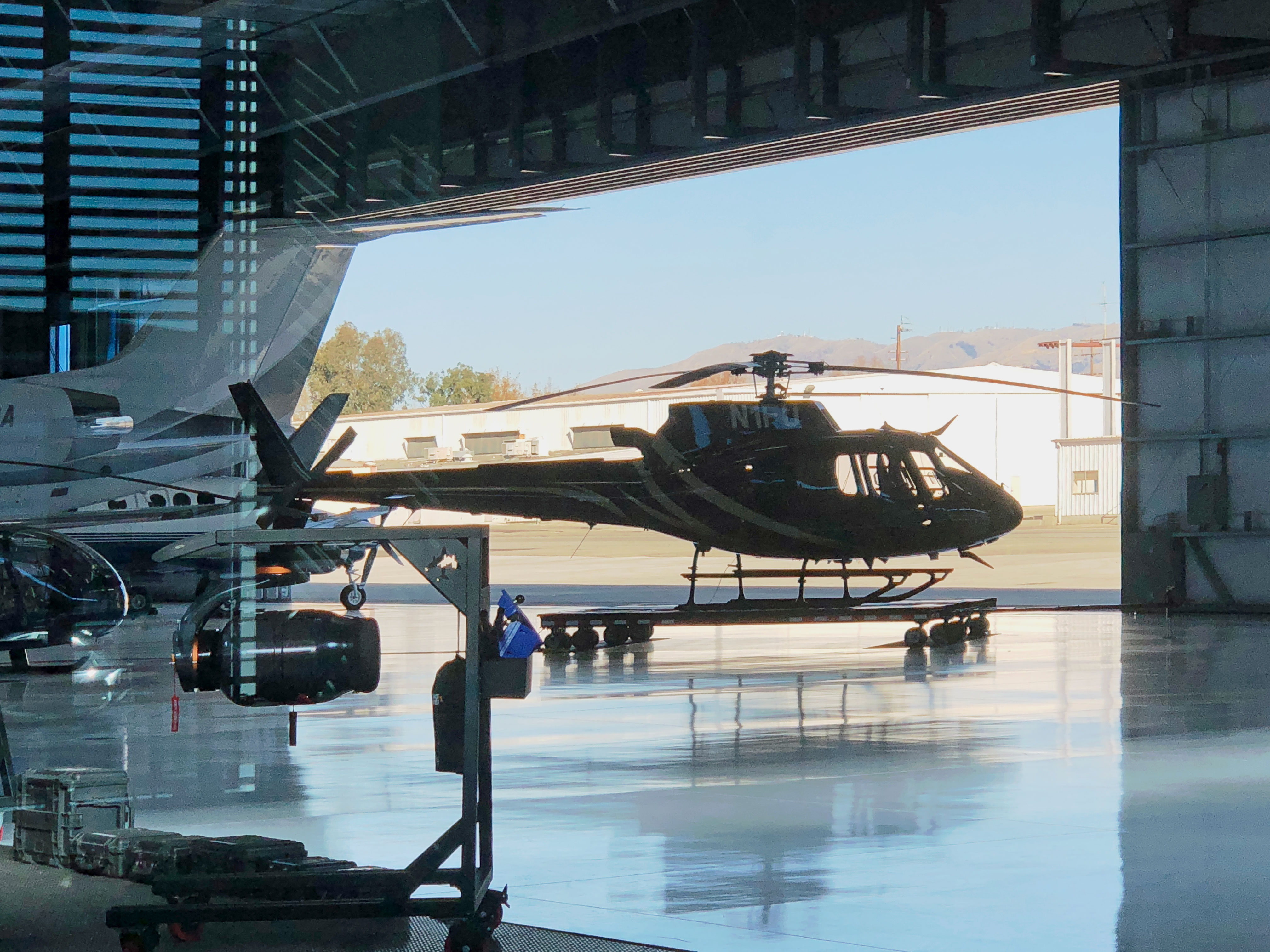 building_construction_group_scott_harris__van_nuys_airport_hanger_interior_helicopter_silohete
